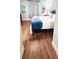 Bedroom with laminate flooring showcasing a comfortable queen bed at 13415 Blue Heron Beach Dr # 1006, Orlando, FL 32821