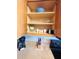 Kitchen cabinet storage with dishes and a glass storage container at 13415 Blue Heron Beach Dr # 1006, Orlando, FL 32821