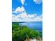 Gorgeous view of lake and tree tops at 13415 Blue Heron Beach Dr # 1006, Orlando, FL 32821