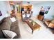Inviting living room featuring a breakfast bar and tile flooring at 13415 Blue Heron Beach Dr # 1006, Orlando, FL 32821