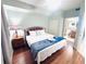 Comfortable main bedroom with hardwood floors and a modern design at 13415 Blue Heron Beach Dr # 1006, Orlando, FL 32821