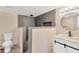 Modern bathroom with tile shower, vanity with a white countertop, and black hardware at 211 Nw 8Th St, Mulberry, FL 33860