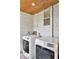 Convenient laundry room featuring a modern washer and dryer for easy chore days at 211 Nw 8Th St, Mulberry, FL 33860