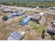 Aerial shot of a home featuring a large private pool at 6531 Red Grange Blvd, Indian Lake Estates, FL 33855