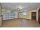 The garage has epoxy flooring, electric opener, overhead lighting, and interior access door at 6531 Red Grange Blvd, Indian Lake Estates, FL 33855