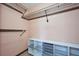 Bright walk-in closet features custom shelving and wire rack system for optimal storage organization at 6531 Red Grange Blvd, Indian Lake Estates, FL 33855