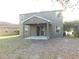 Backyard with patio and view at 6954 Glenbrook Dr, Lakeland, FL 33811