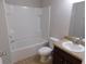 Full bathroom has tile floors, a single vanity and a shower-tub combination at 6954 Glenbrook Dr, Lakeland, FL 33811