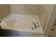 Enjoy a relaxing soak in this bathtub with tile surround at 6954 Glenbrook Dr, Lakeland, FL 33811