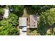 Birds-eye view of property featuring lush landscaping and a serene setting at 7165 Cr 655, Bushnell, FL 33513