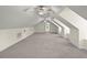 Finished attic features high ceilings, three ceiling fans, and natural light at 7165 Cr 655, Bushnell, FL 33513