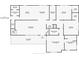 Home floor plan featuring primary bedroom, bathroom, living room, kitchen, closets and detached garage at 7165 Cr 655, Bushnell, FL 33513