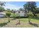 Charming home with a manicured lawn and mature trees at 7165 Cr 655, Bushnell, FL 33513