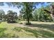Inviting picnic area with covered shelter and ample seating amidst a serene, natural setting at 7165 Cr 655, Bushnell, FL 33513