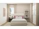 Bright bedroom featuring soft pink walls, a comfortable bed, a stylish desk, and natural light at 2251 Rider Rain Ln, Apopka, FL 32703