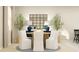 Formal dining room boasts decor such as a round table, white chairs, lamps, and decorative mirror at 2341 White Buffalo St, Apopka, FL 32703