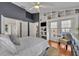 Comfortable main bedroom with built-in shelving, en-suite bathroom access, and doors to the outside at 2719 Osprey Creek Ln, Orlando, FL 32825