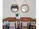 Dining room with seating for six, hardwood floors and natural light making it ideal for Gathering gatherings at 3282 Armstrong Ave, Clermont, FL 34714