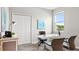 Bright home office with a large window, neutral walls and carpeted floors, conducive for remote work at 3282 Armstrong Ave, Clermont, FL 34714