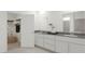 Spacious bathroom with double vanity and a large closet, perfect for organization at 5660 Vinyasa Rd, Clermont, FL 34714