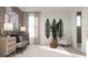 Calm Bedroom with natural lighting, crib and rocking chair at 5660 Vinyasa Rd, Clermont, FL 34714