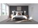 Inviting bedroom featuring large windows, a cozy rug, and elegant, neutral decor at 5660 Vinyasa Rd, Clermont, FL 34714
