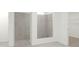 Tiled shower enclosure with glass partition, offering a clean and modern design at 5660 Vinyasa Rd, Clermont, FL 34714