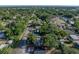 Aerial view showcasing the property and its proximity to local street at 1205 Crestwood Dr, Winter Haven, FL 33881