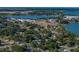 Aerial view of a residential area with easy access to a lake and other various amenities at 1205 Crestwood Dr, Winter Haven, FL 33881