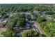 Aerial view of a home featuring a nice location in a tree filled neighborhood at 1205 Crestwood Dr, Winter Haven, FL 33881