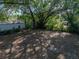 Overhead shot of the backyard featuring mature trees offering ample shade at 1205 Crestwood Dr, Winter Haven, FL 33881