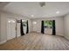 Spacious living room featuring new flooring, natural light, and neutral color scheme at 1205 Crestwood Dr, Winter Haven, FL 33881