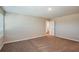 Neutral bedroom with carpet flooring and view to an ensuite bathroom at 1752 Frogmore Ave, Haines City, FL 33844