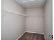Walk-in closet with ample storage space and wire shelving at 1756 Frogmore Ave, Haines City, FL 33844