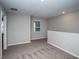 Spacious loft area featuring neutral paint, plush carpeting and a window providing natural light at 1756 Frogmore Ave, Haines City, FL 33844