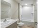 Bathroom featuring a bathtub, shower, single vanity, and tile flooring at 1760 Frogmore Ave, Haines City, FL 33844
