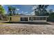 Back exterior of home showing the back patio area at 210 Alta Vista St, Debary, FL 32713