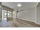 Bright and open living room featuring wood-look flooring, neutral paint and lots of natural light at 210 Alta Vista St, Debary, FL 32713