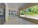Enclosed patio featuring tile floors and screens providing outdoor views at 210 Alta Vista St, Debary, FL 32713