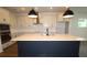 Close up on the spacious kitchen island featuring stainless steel appliances at 6069 Sacred Oak Ave, Mount Dora, FL 32757