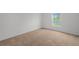 Bedroom featuring plush carpeting and a view of the lake at 431 Caribbean Ct, Poinciana, FL 34759