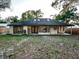 Home's backyard featuring a covered patio perfect for outdoor enjoyment at 1507 Wheeler Rd, Apopka, FL 32703