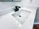 Close up of white bathroom vanity with modern, black faucet at 1507 Wheeler Rd, Apopka, FL 32703