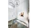 Bright foyer with high ceilings, large window, and slate floors that leads to the living room at 1507 Wheeler Rd, Apopka, FL 32703