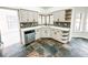 Updated kitchen area with stainless steel appliances, and designer backsplash at 1507 Wheeler Rd, Apopka, FL 32703