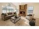 Bright living room featuring neutral colors, fireplace and ample light at 1507 Wheeler Rd, Apopka, FL 32703