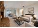 Cozy living room with fireplace and dining area at 1507 Wheeler Rd, Apopka, FL 32703