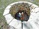 Well in yard lined with stone at 1507 Wheeler Rd, Apopka, FL 32703