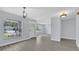 Bright and airy living room with modern flooring, fresh paint, and an inviting ambiance at 1913 Poinsetta Ln, Maitland, FL 32751