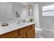 Bathroom featuring a vanity with a sink, a bathtub, and bright natural light at 8646 La Isla Dr, Kissimmee, FL 34747
